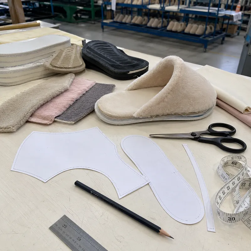 Custom plush slipper pattern making with paper templates fabric swatches and sole samples