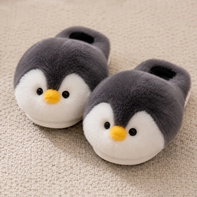 Penguin plush slippers with rounded head and beak shape forming